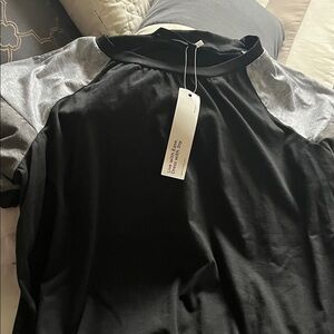 BloomChic Black Top with Gray Accents brand new with tags